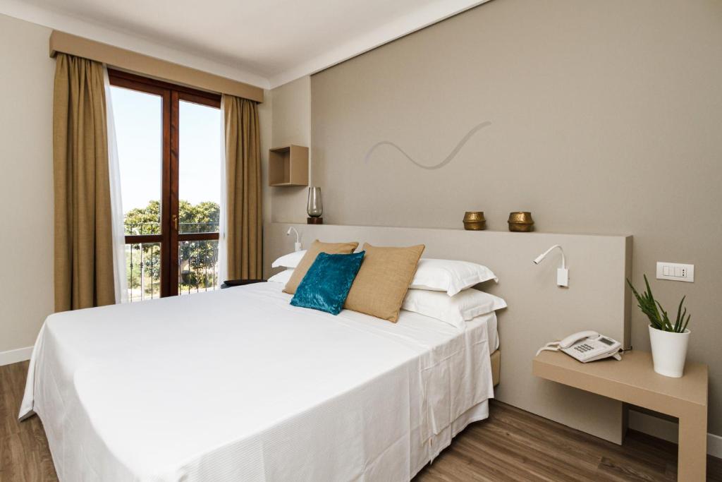 Postel nebo postele na pokoji v ubytování Seawater Hotel Bio & Beauty Spa