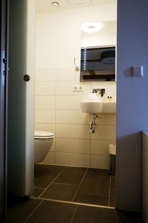 Koupelna v ubytování Hotel & Restaurant Adler Ittendorf - 24h Self-CheckIn
