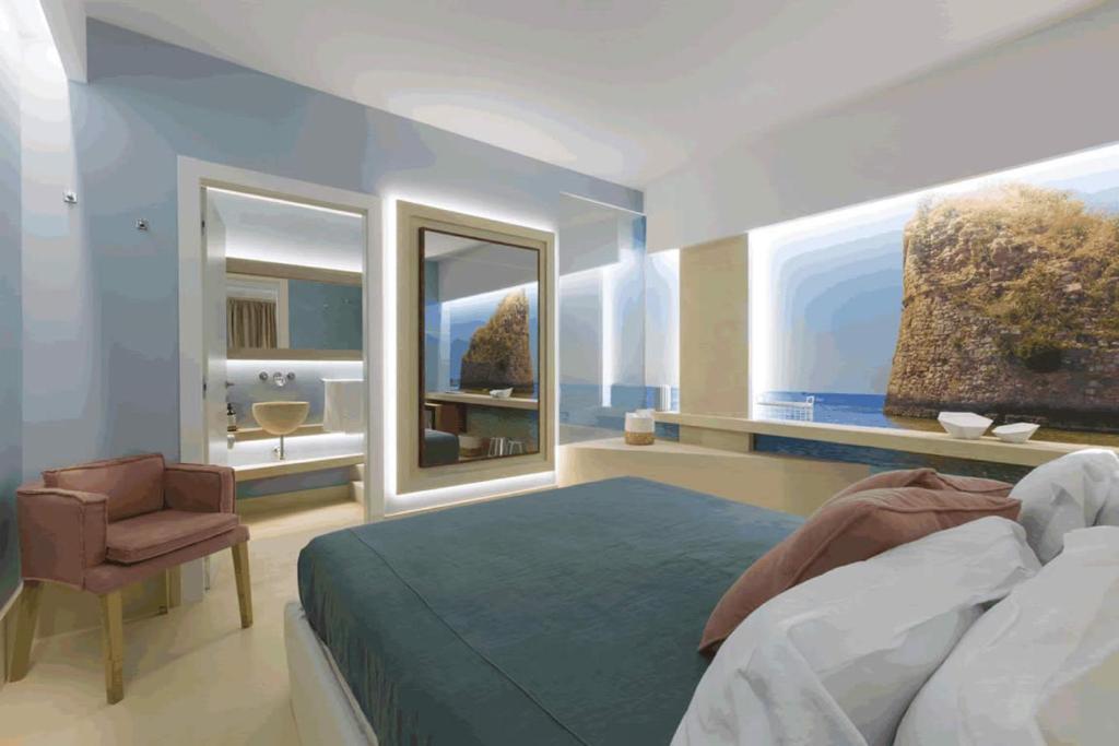 Postel nebo postele na pokoji v ubytování Terra d'Acqua Resort & SPA