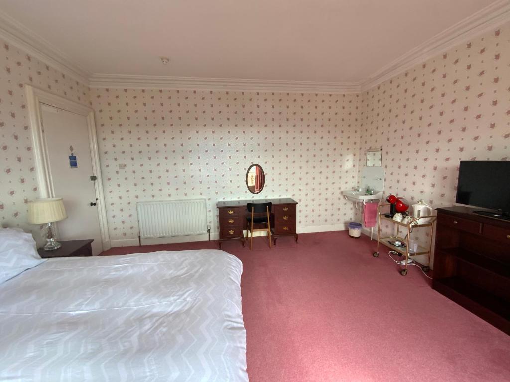 Letto o letti in una camera di Dunrigh Guest House