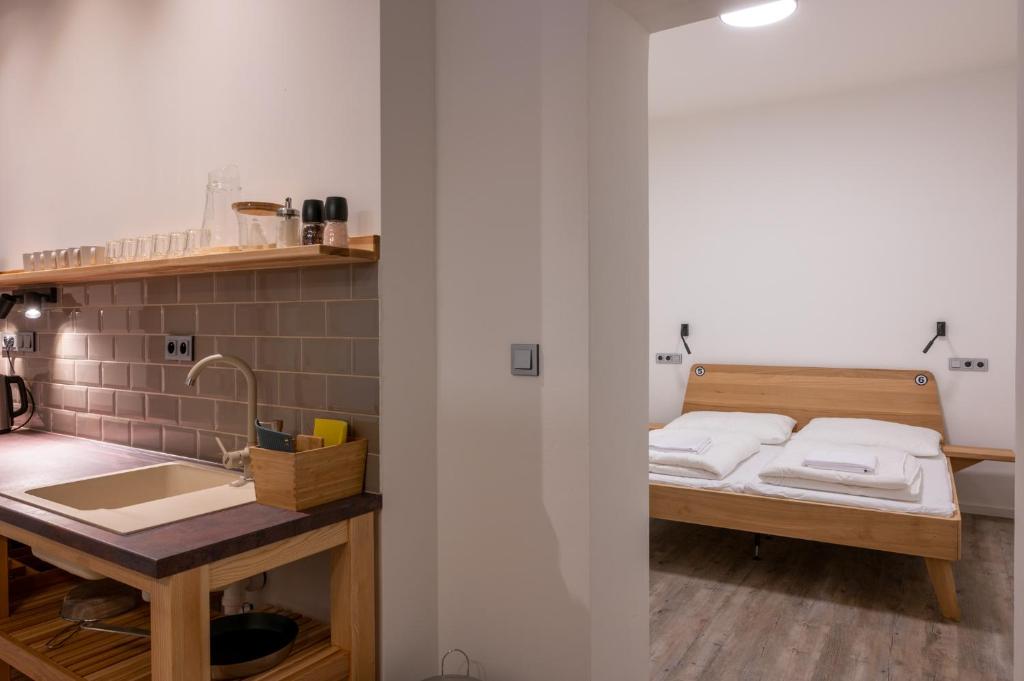 Katil atau katil-katil dalam bilik di ART Hostel & Apartments