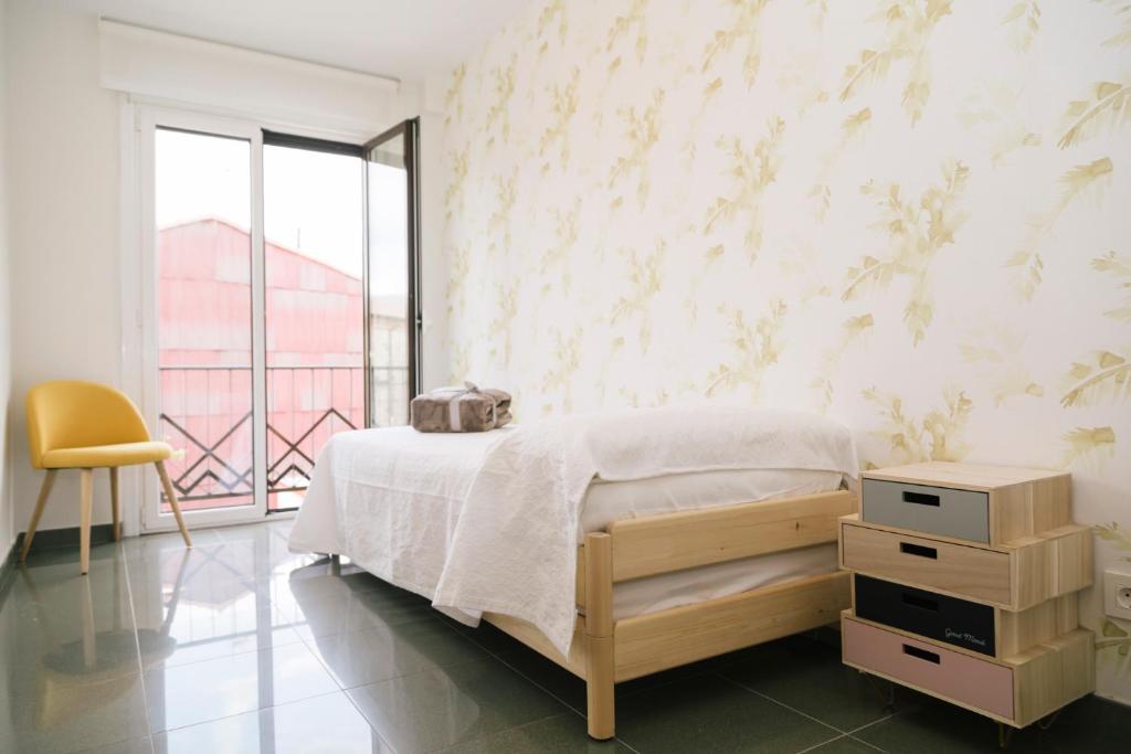 A bed or beds in a room at Casa peñasBLANCAS en Duruelo de la sierra Soria 12personas