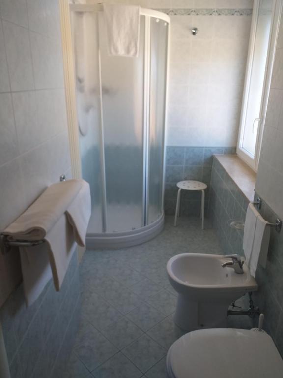 Koupelna v ubytování Hotel Monna Lisa