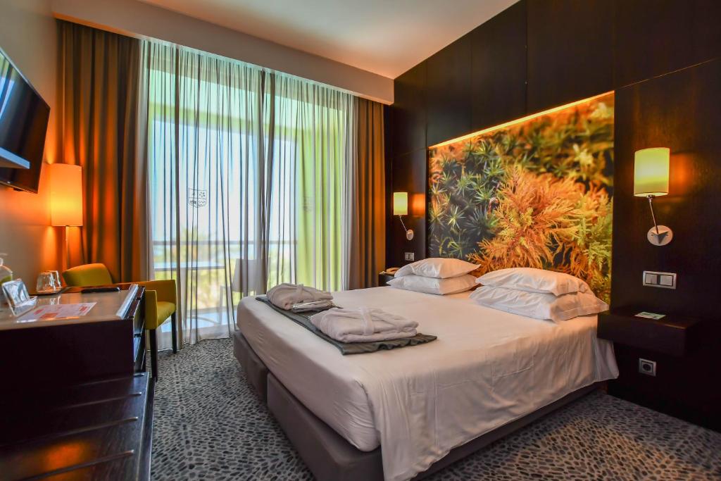 Postel nebo postele na pokoji v ubytování Quinta Mirabela - Design Hotel