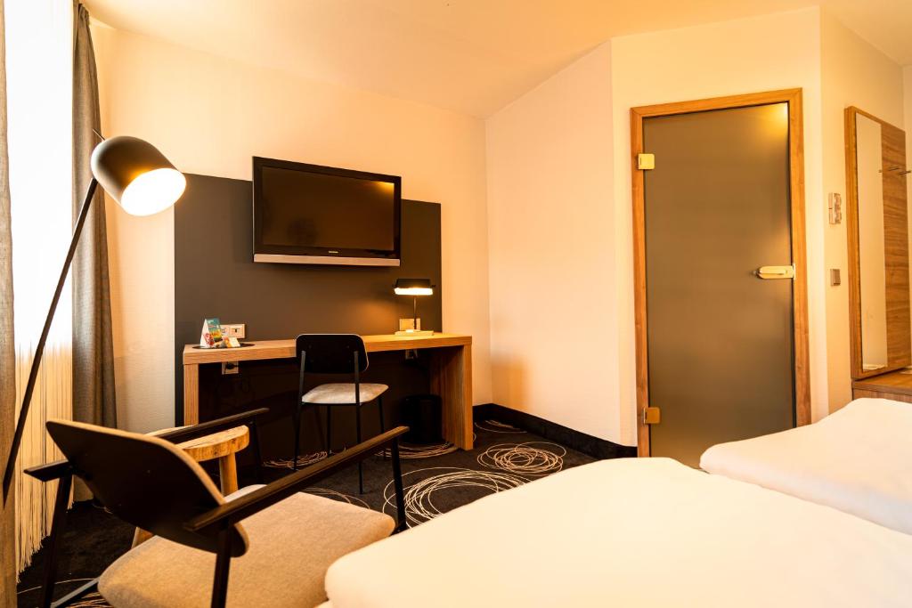 Voodi või voodid majutusasutuse Hotel Rio toas