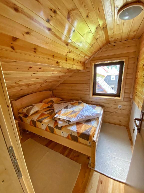 Postel nebo postele na pokoji v ubytování Apartments Vuković