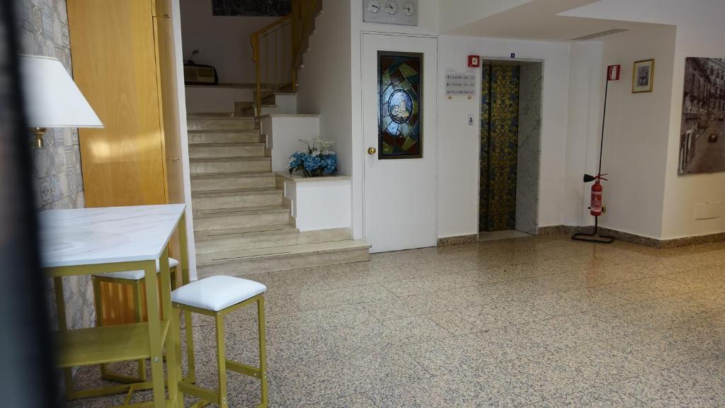 TV a/nebo společenská místnost v ubytování Hotel Bristol