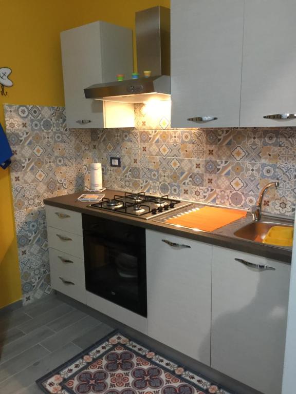 Kuchyňa alebo kuchynka v ubytovaní FILOMENA HOME
