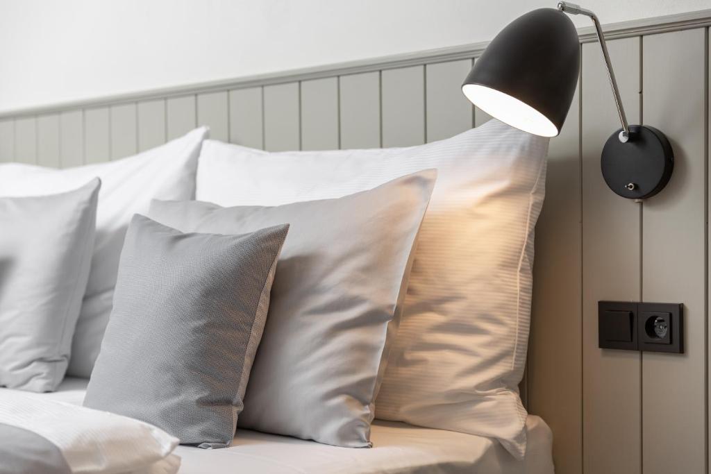 Postel nebo postele na pokoji v ubytování Hotel Orlík