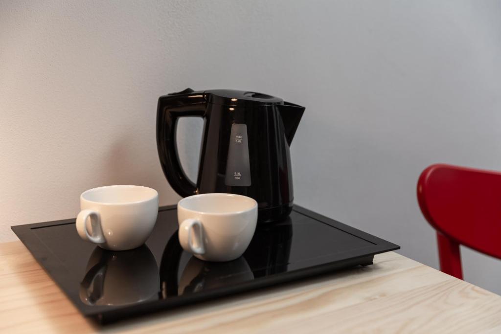 Příslušenství pro přípravu čaje a kávy v ubytování Hotel Orlík