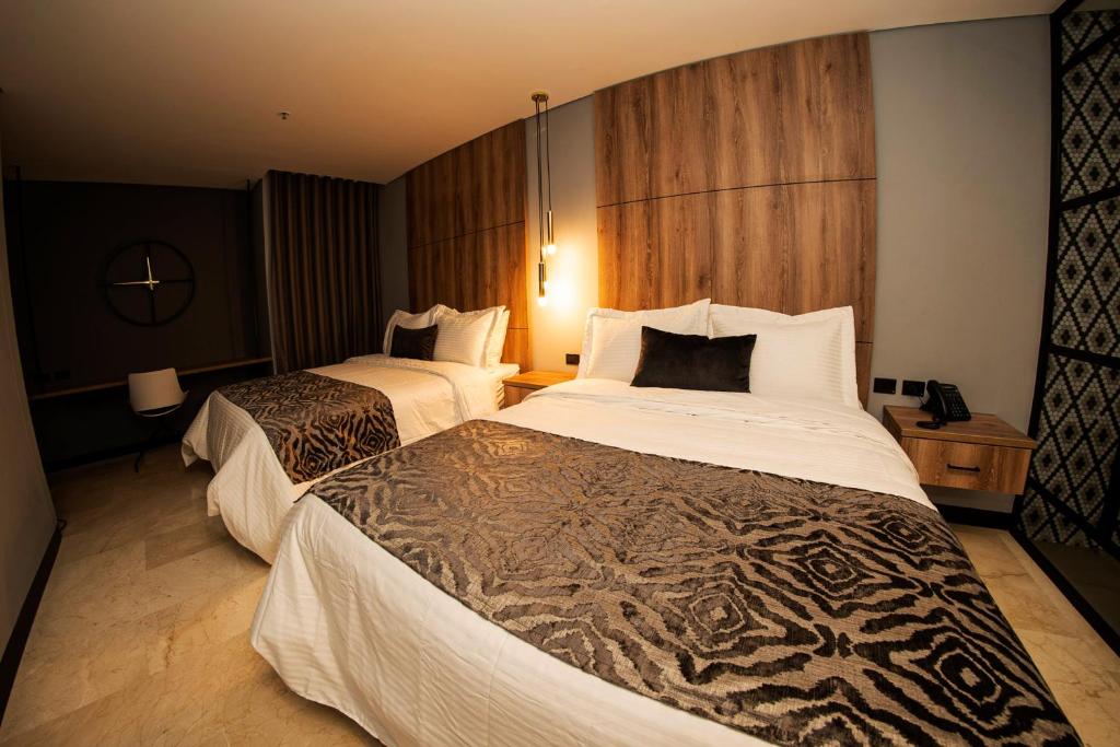 Postel nebo postele na pokoji v ubytování Cavalta by Bernalo Hotels
