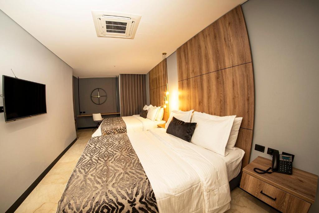 Postel nebo postele na pokoji v ubytování Cavalta by Bernalo Hotels