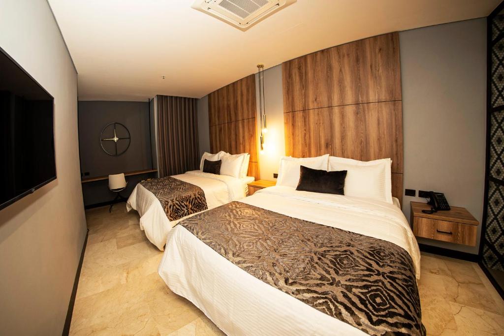 Postel nebo postele na pokoji v ubytování Cavalta by Bernalo Hotels