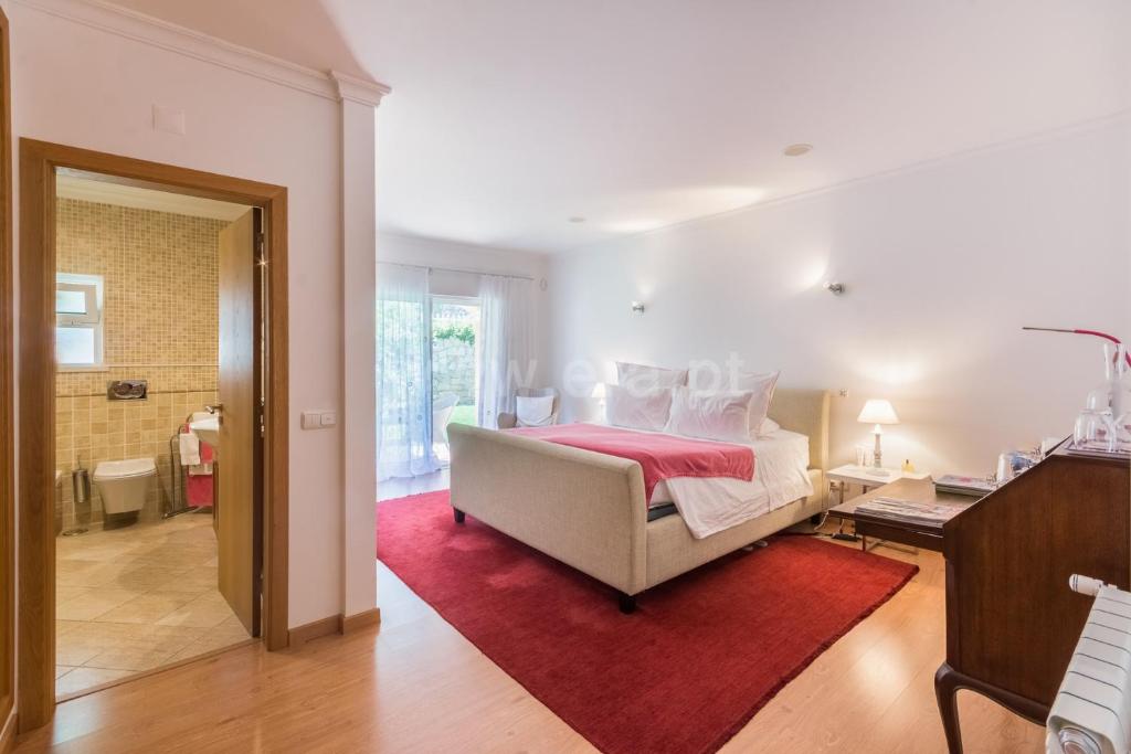 Postel nebo postele na pokoji v ubytování Casa Mocho Branco