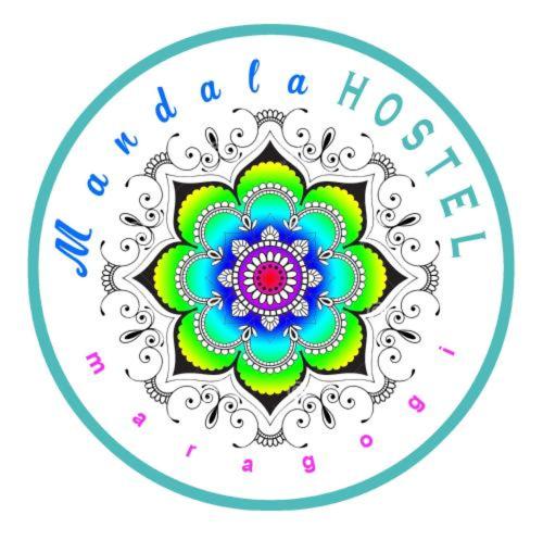 馬拉戈日的住宿－Mandala Hostel Maragogi Oficial，圆圈中一朵花的画