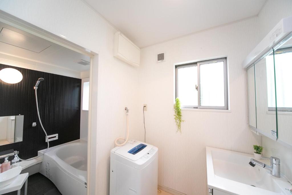 Koupelna v ubytování Yokkaichi Hazunaka Hotel