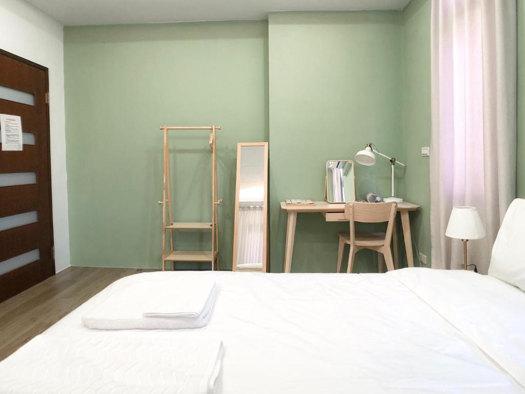 Postel nebo postele na pokoji v ubytování Rightday Inn