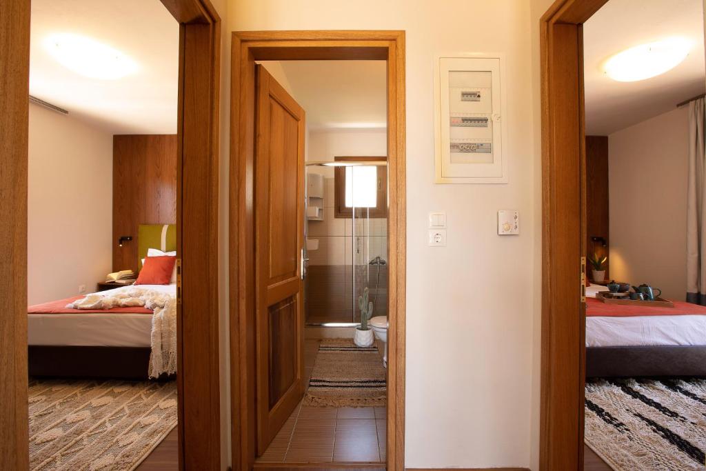 Postel nebo postele na pokoji v ubytování Skiathos Avaton Hotel, Philian Hotels & Resorts