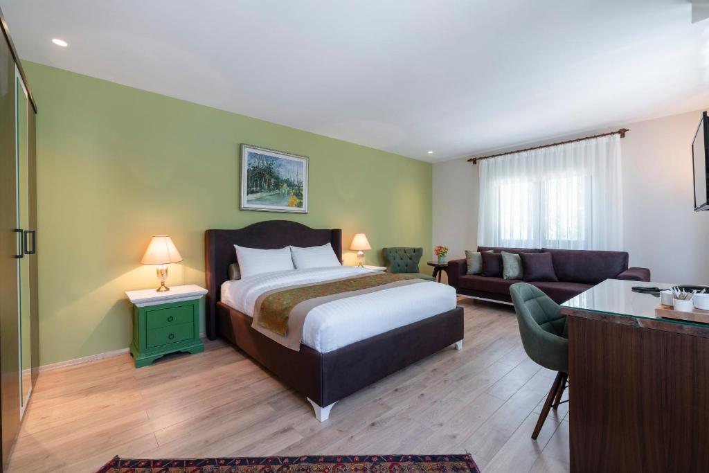 Postel nebo postele na pokoji v ubytování SUNOLUS VINEYARDHOUSe