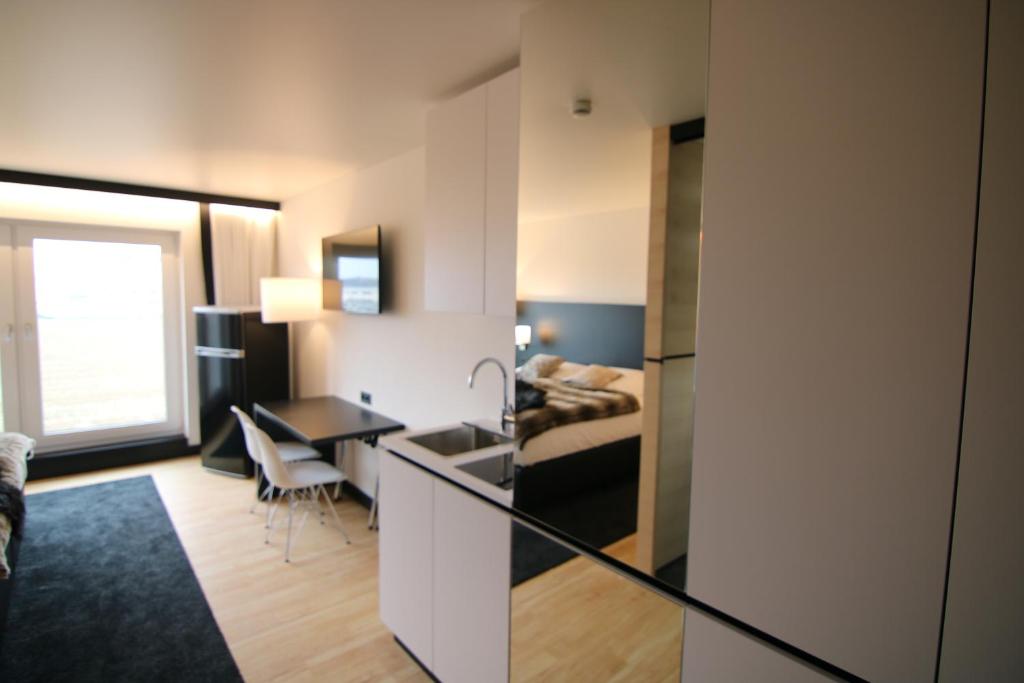 Postel nebo postele na pokoji v ubytování FÜ Hotel by WMM Hotels