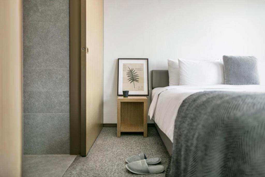 Postel nebo postele na pokoji v ubytování Hotel Stage