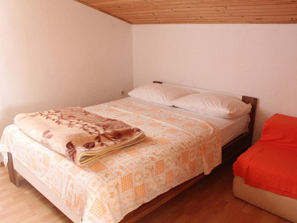 Postel nebo postele na pokoji v ubytování Apartments Šiša