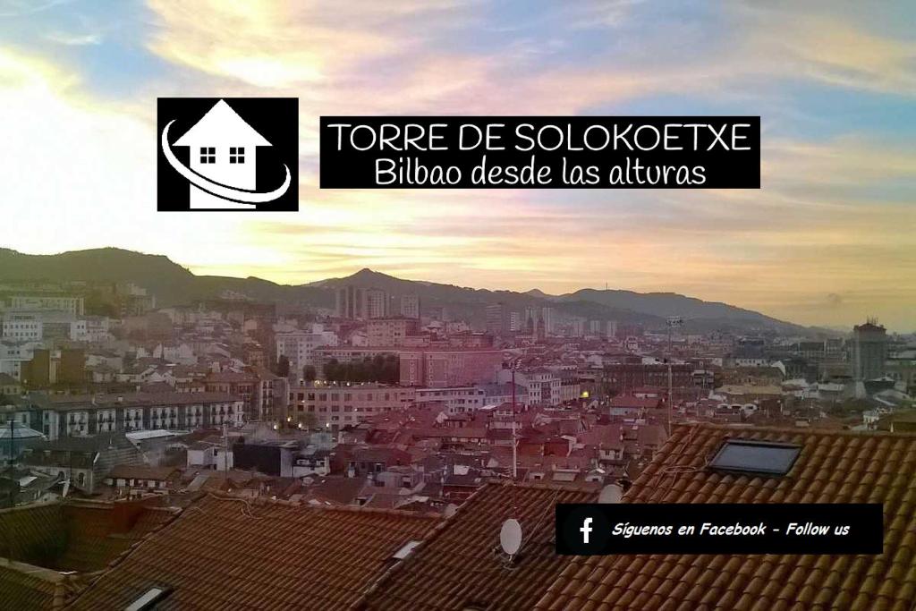 un'immagine di una città con le parole "tono di soliloquio bililo" di Alojamiento en TORRE SOLOKOETXE License LBI227 a Bilbao