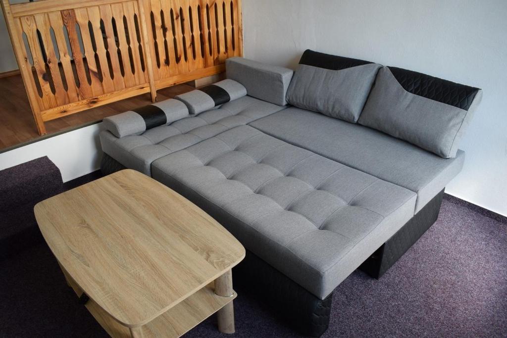 Postel nebo postele na pokoji v ubytování Apartmány Kubova Huť