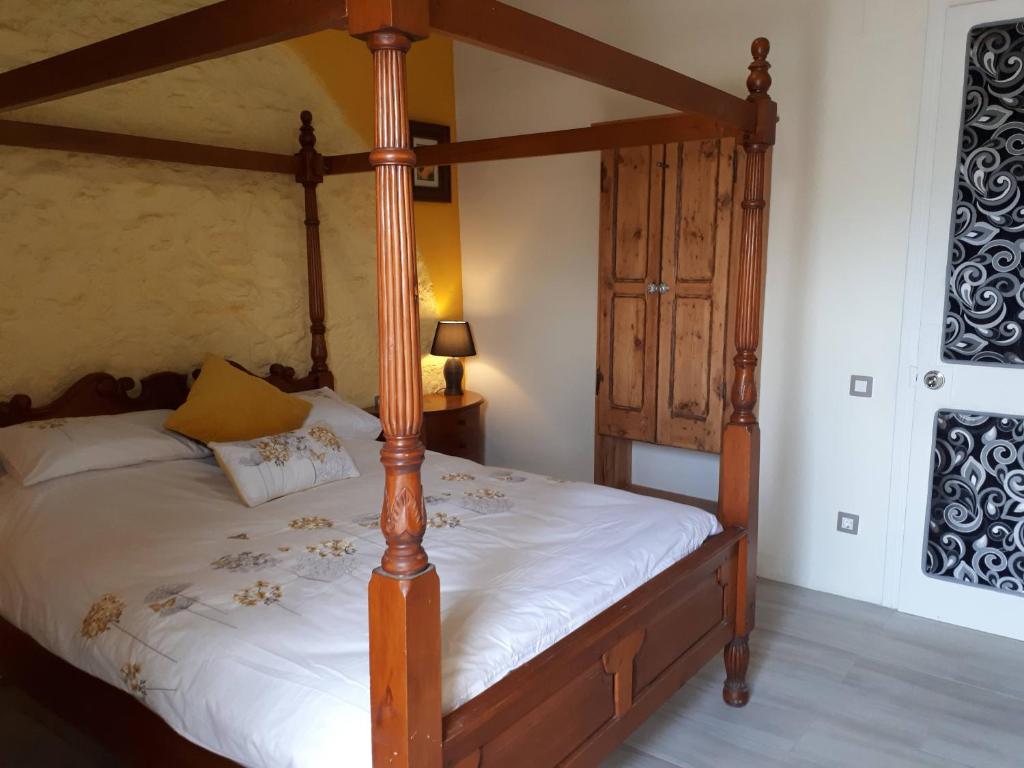 A bed or beds in a room at Casa de Bello