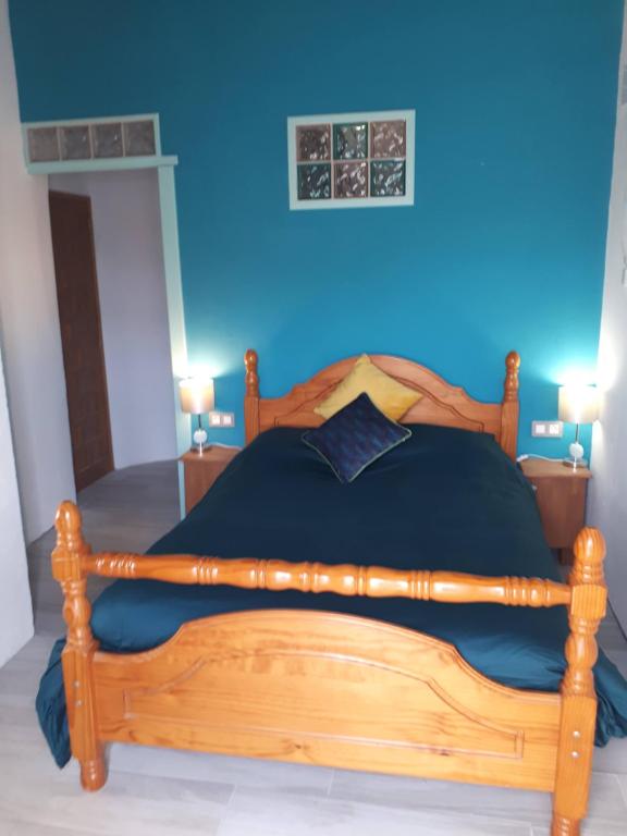 A bed or beds in a room at Casa de Bello