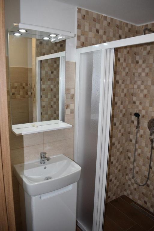 Koupelna v ubytování Apartmány Kubova Huť
