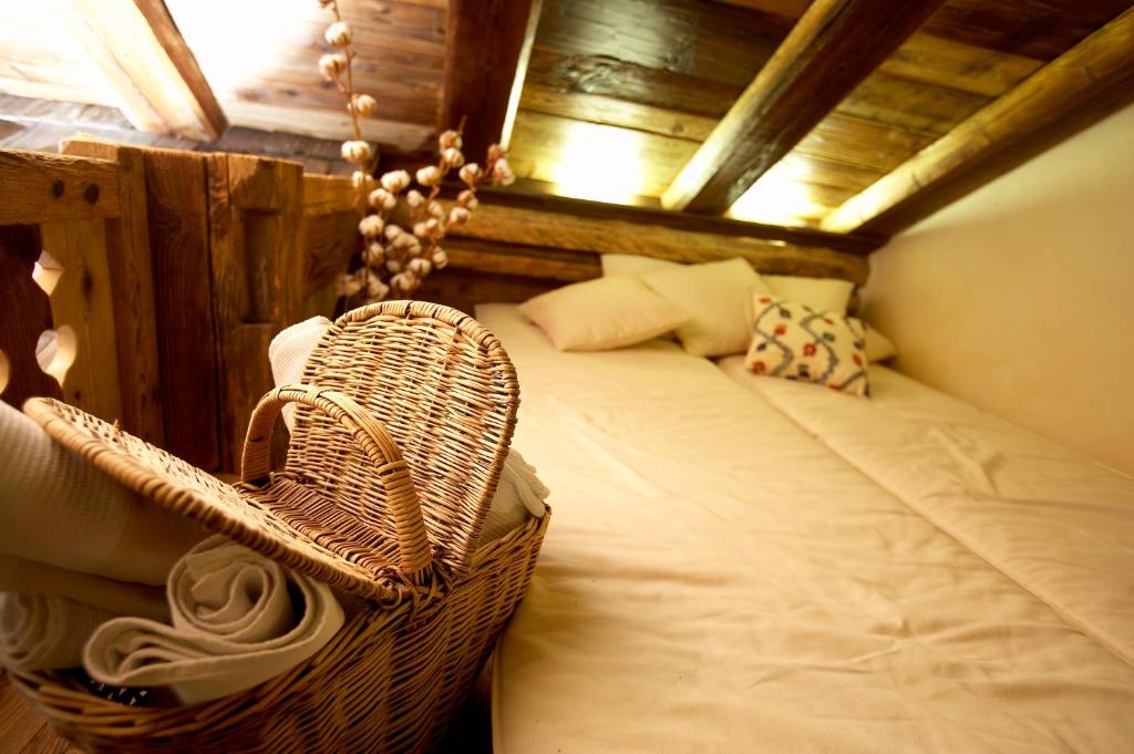 Postel nebo postele na pokoji v ubytování Hotel Du Grand Paradis - 1899 Auberge Boutique