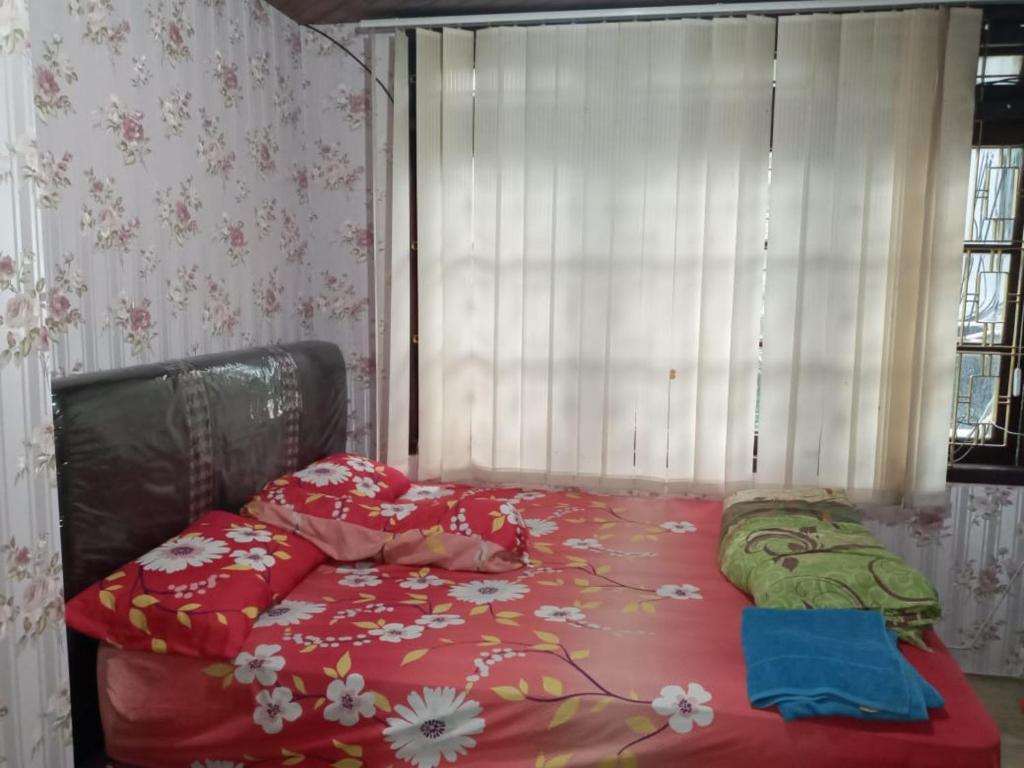 Postel nebo postele na pokoji v ubytování Mayestik Guest House Syariah