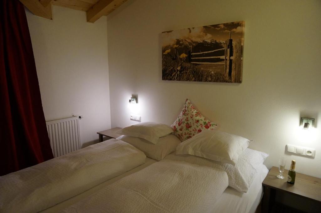 Posteľ alebo postele v izbe v ubytovaní Haus Senoner