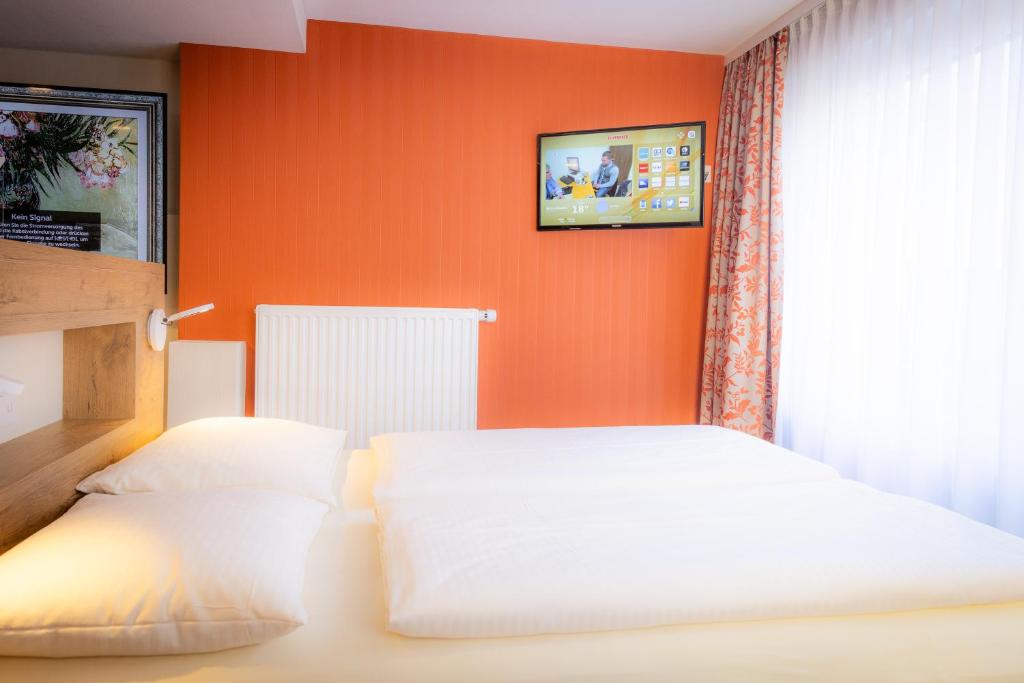 Postel nebo postele na pokoji v ubytování Hotel Azenberg