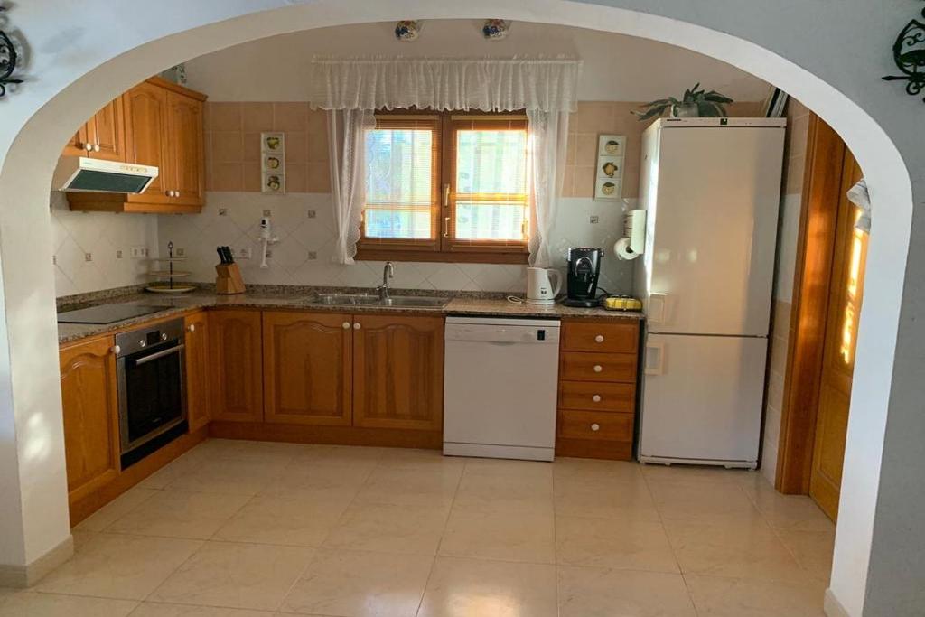 Kuchyň nebo kuchyňský kout v ubytování Villa Aurora