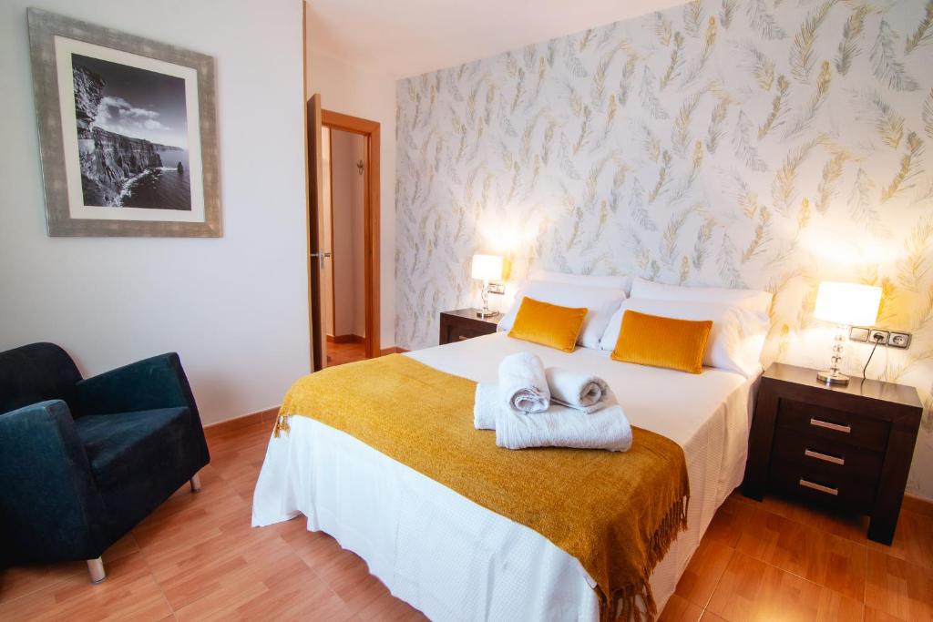 Posteľ alebo postele v izbe v ubytovaní Ibericabeds Centro Gracia