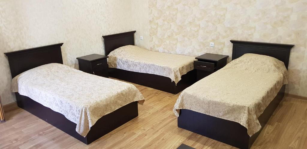 Voodi või voodid majutusasutuse Ruzan hotel toas