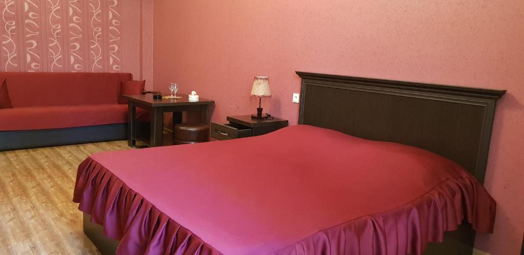 Voodi või voodid majutusasutuse Ruzan hotel toas