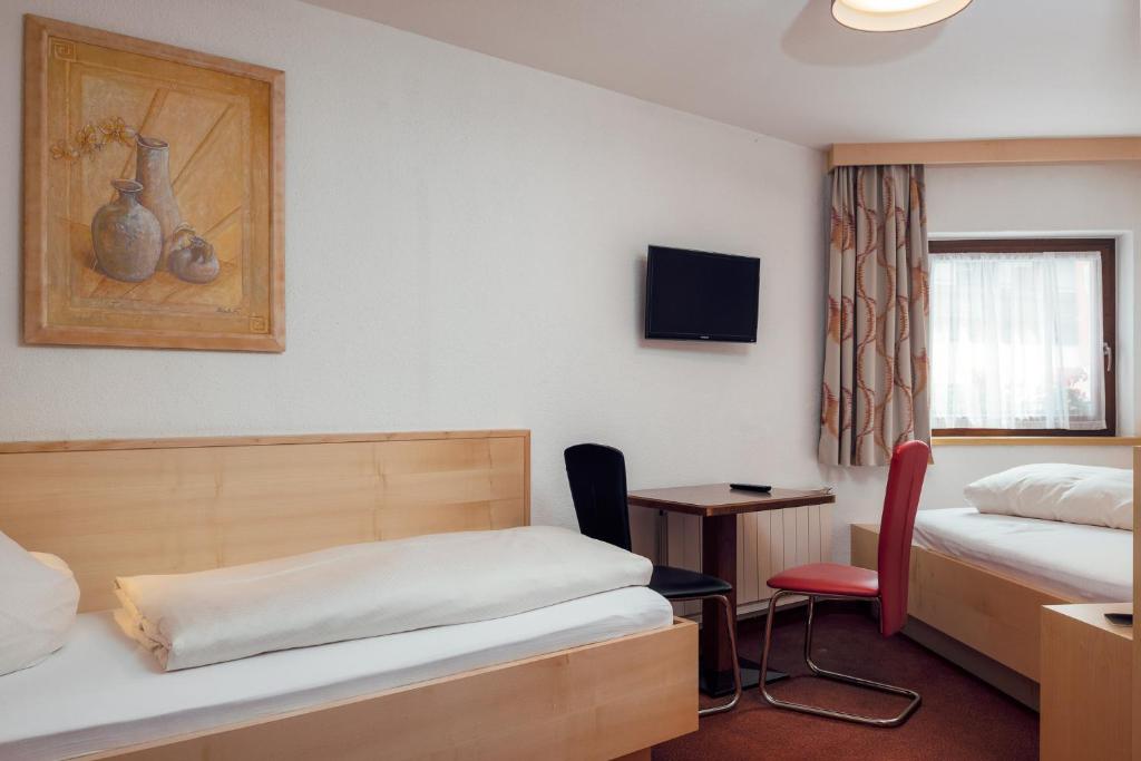 Postel nebo postele na pokoji v ubytování Hotel Restaurant Claudia - inklusive SUPER SOMMER CARD