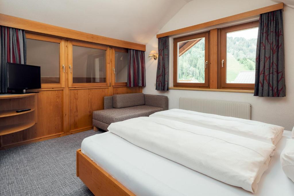 Postel nebo postele na pokoji v ubytování Hotel Restaurant Claudia - inklusive SUPER SOMMER CARD