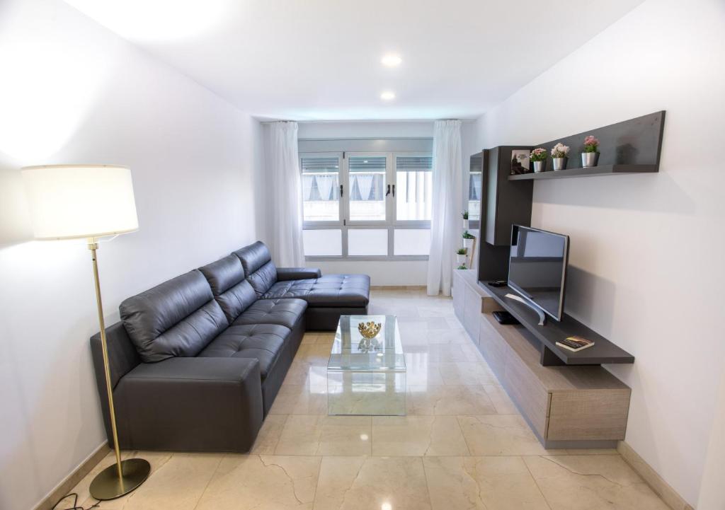 Televízia a/alebo spoločenská miestnosť v ubytovaní Ferreras Canteras Home By CanariasGetaway