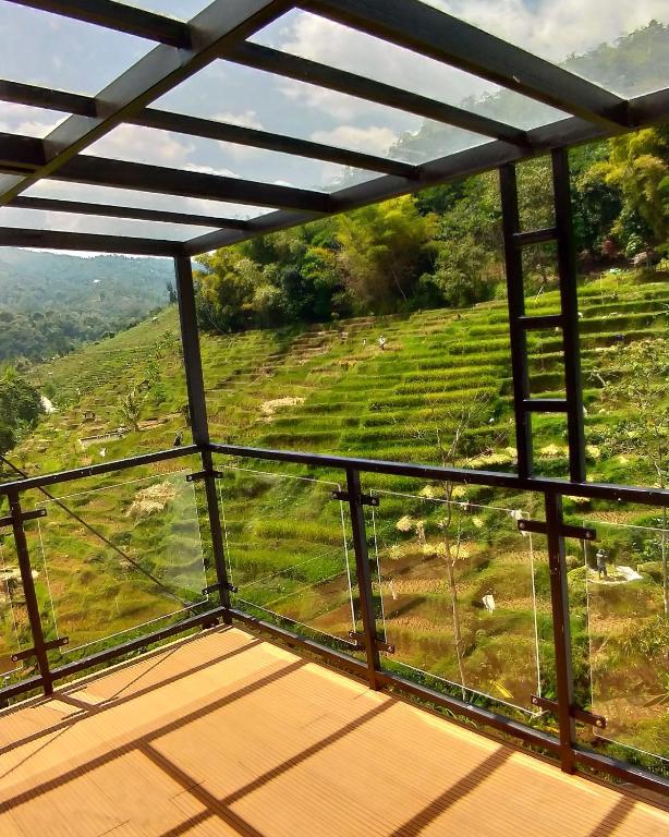 Rumah Kina Putih - バルコニー付きデラックスダブルルーム