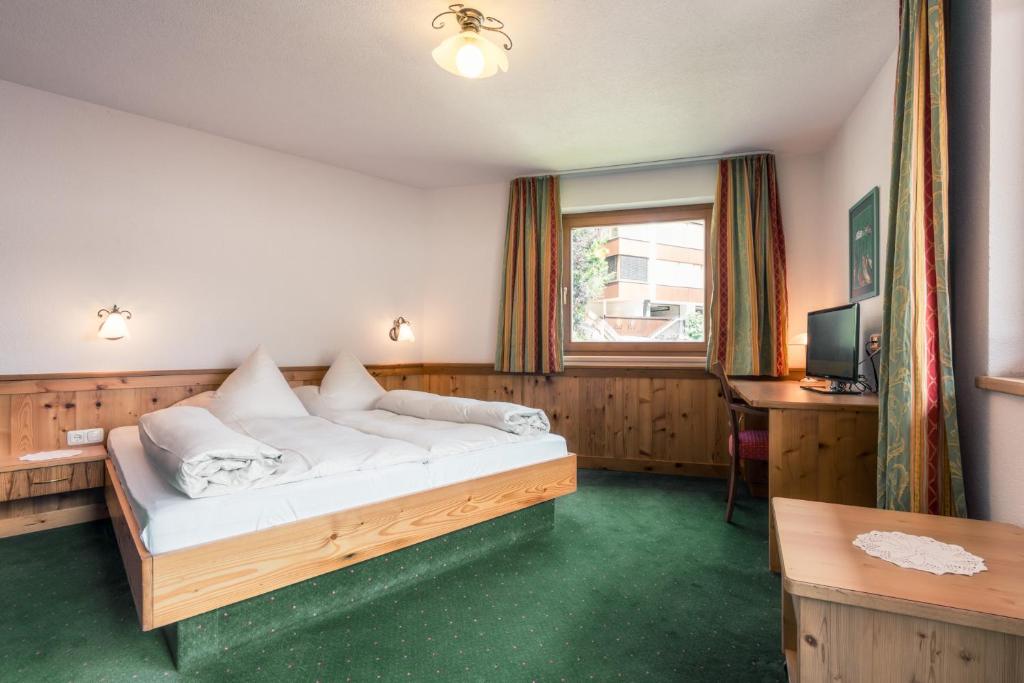 Postel nebo postele na pokoji v ubytování Hotel Restaurant Claudia - inklusive SUPER SOMMER CARD