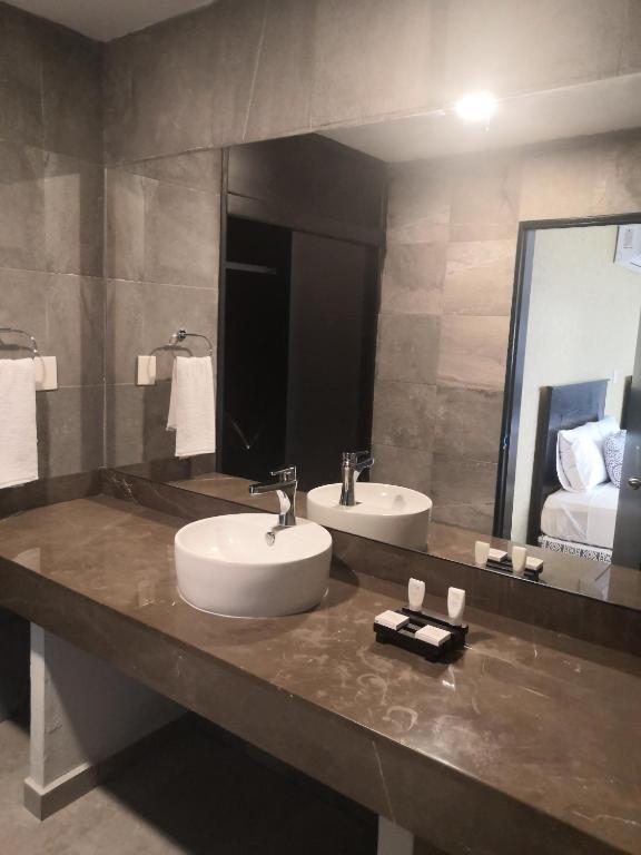 Koupelna v ubytování Hotel Costa Verde