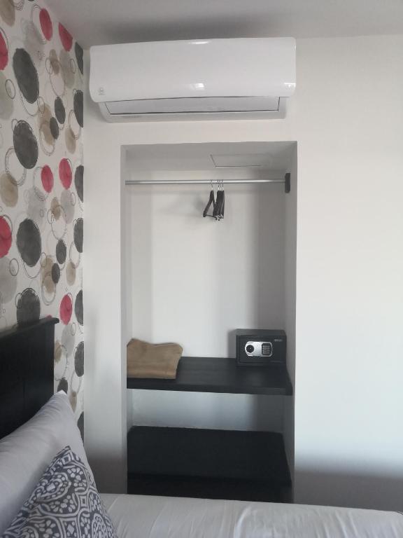 Postel nebo postele na pokoji v ubytování Hotel Costa Verde