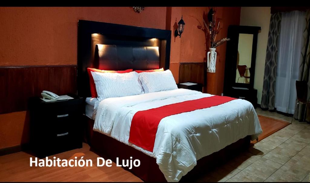 Postel nebo postele na pokoji v ubytování Hotel Murillo Plaza