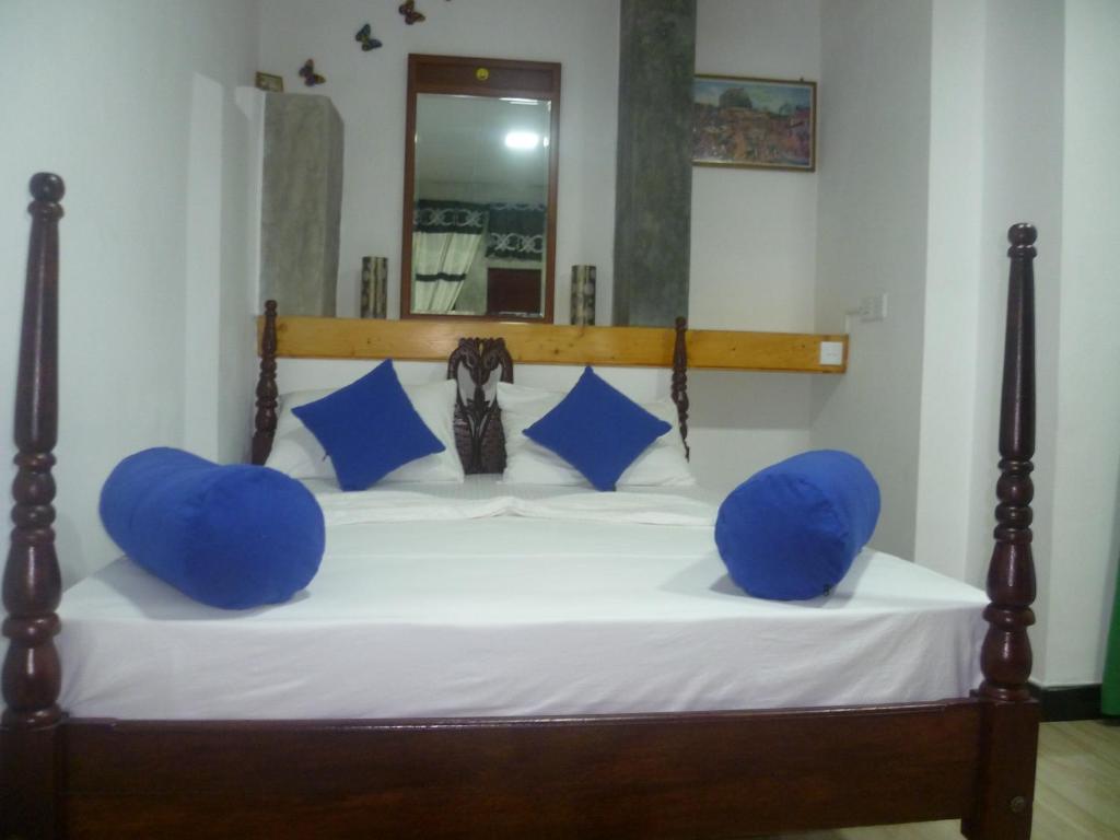 Ένα ή περισσότερα κρεβάτια σε δωμάτιο στο The Villa Sunshine