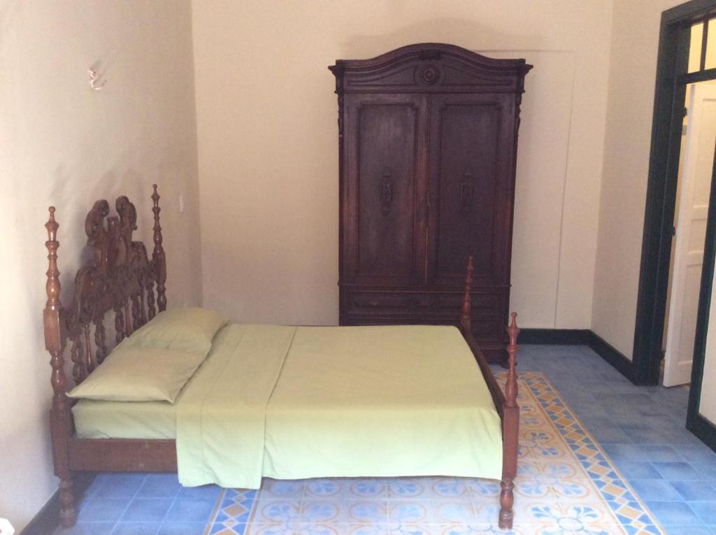 Postel nebo postele na pokoji v ubytování Casa Frankie