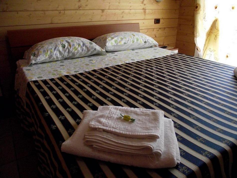 Postel nebo postele na pokoji v ubytování BeB Casa Di Lety